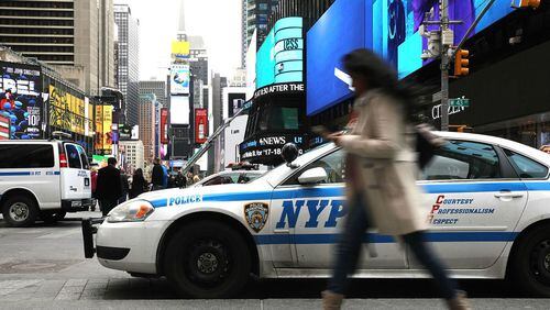 A New York police cruiser is seen in Times Square on April 7, 2017.