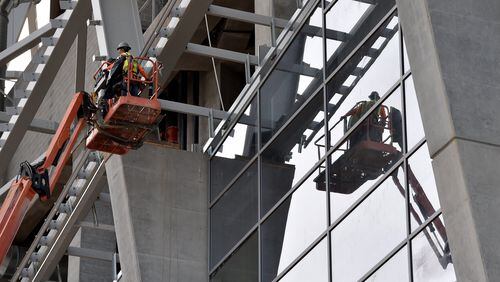Construction has been a strong sector in metro Atlanta of late, in part because of major projects such as the new Falcons stadium, shown here. BRANT SANDERLIN/BSANDERLIN@AJC.COM