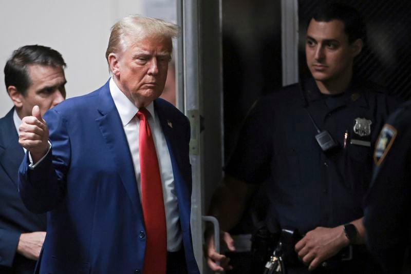 Former President Donald Trump returns from a short break during his trial at Manhattan criminal court on Monday, May 6, 2024, in New York. (Win McNamee/Pool Photo via AP)