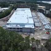 Aerial photograph shows construction site of DataBank ATL 4, at 200 Selig Drive, in Atlanta on Saturday, Jan. 6, 2024. DataBank operates 5 data centers in metro Atlanta. Georgia is attracting creation of new data centers with tax incentives. The often-stark warehouses packed with computer servers are heavy users of electricity and water. (Hyosub Shin / Hyosub.Shin@ajc.com)