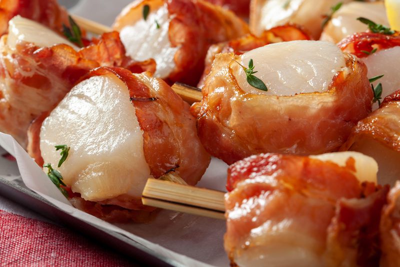Bacon-wrapped sea scallops from City Pier Seafood. Courtesy of Brian Urkevic Photography