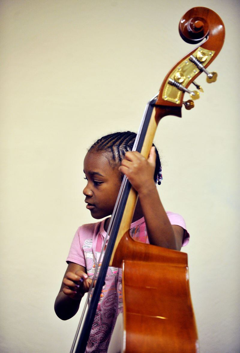 The Atlanta Music Project brings music education to children in underserved neighborhoods. (AJC/ Bita Honarvar)