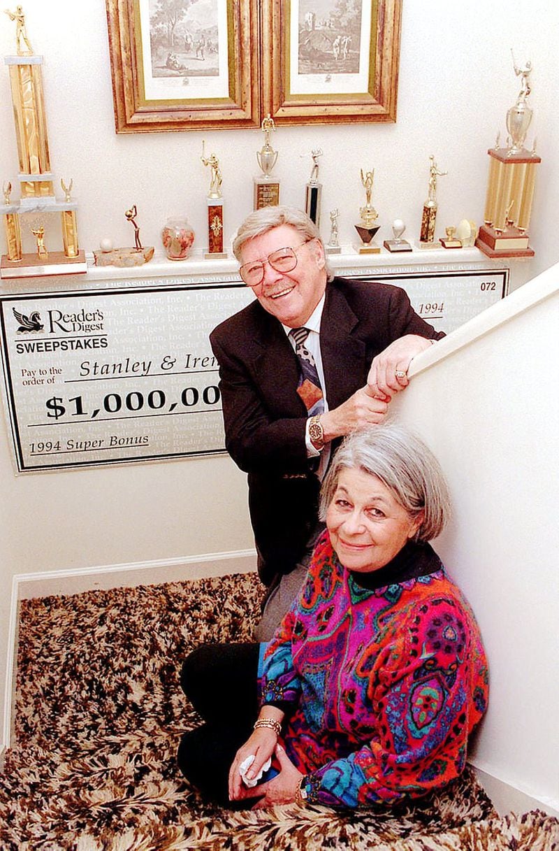 Stanley and Irene Sasine won a million bucks in the Reader’s Digest Sweepstakes back in 1994. Their lifestyle changed only a little bit: They played more golf. AJC FILE PHOTO