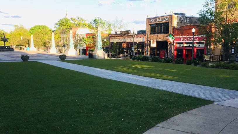 The almost always vibrant Decatur square has been silent for weeks and will stay that way in the foreseeable future. No City of Decatur restaurant has said when they are opening for on-premises dining. Bill Banks for the AJC