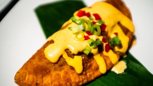 The simply named empanada de pollo at Loca Luna belies the complexity of the flavors found inside.