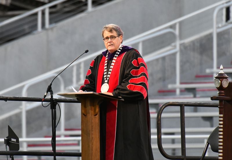 University of Georgia President Jere Morehead introduces faculty members during the 2020 Spring Undergraduate Commencement ceremony at Sanford Stadium in Athens on Oct. 16, 2020. (Hyosub Shin / Hyosub.Shin@ajc.com)
