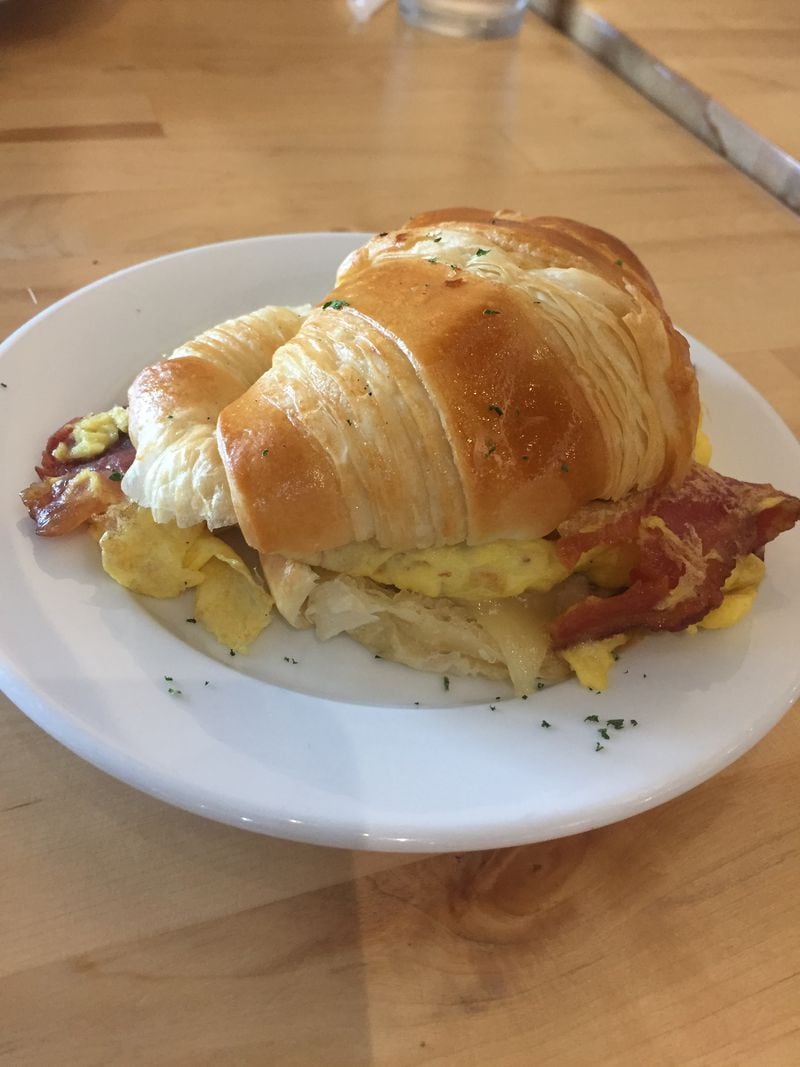 Try an egg croissant with melted Swiss and bacon at Douceur de France (locations in Roswell and Marietta).