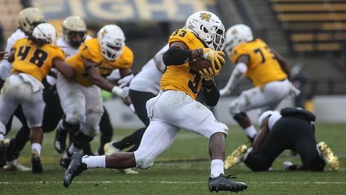 Kennesaw State running back Darnell Holland (33) runs the ball for a touchdown during an FCS playoff game against the Wofford Terriers, Saturday, Dec. 1, 2018, Kennesaw, Ga.  BRANDEN CAMP/SPECIAL