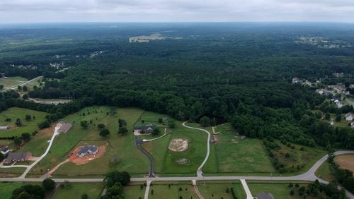 Aerial view of the 160 acres near June Ivey and Indian Shoals roads near Dacula proposed for a new subdivision development. HYOSUB SHIN / HSHIN@AJC.COM