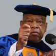 U.S. Rep. John Lewis addresses Emory University graduates in his moving 2014 commencement address, where Lewis encouraged a new generation of political activists to cause "good trouble" to bring about positive change in the country. Lewis died in July 2020. (Staff file photo by Bob Andres / AJC)