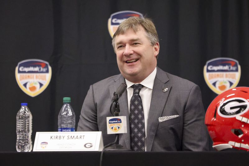 Georgia head coach Kirby Smart reacts during the head coaches joint press conference at the Le Meridien Dania Beach Hotel, Friday, Dec., 29, 2023, in Fort Lauderdale, Florida. (Jason Getz / Jason.Getz@ajc.com)