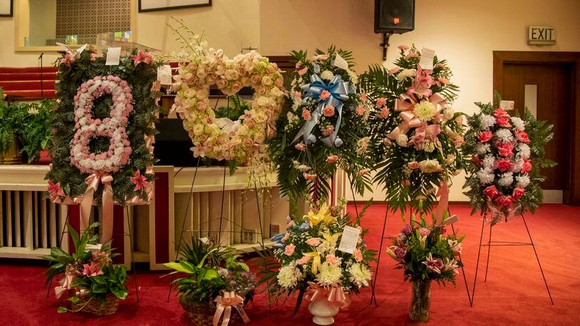 07/15/2020 - Atlanta, Georgia - More than a dozen floral arrangements are displayed near the coffin of Secoriea Turner during her homegoing service at New Calvary Missionary Church in Atlanta's Sylvan Hills community on Wednesday, July 15, 2020. On July 4, 8-year-old Secoriea was shot dead near the Wendy's in Atlanta's Peoplestown community. She was one of five individuals who were killed over the Independence Day weekend in Atlanta. (ALYSSA POINTER / ALYSSA.POINTER@AJC.COM)