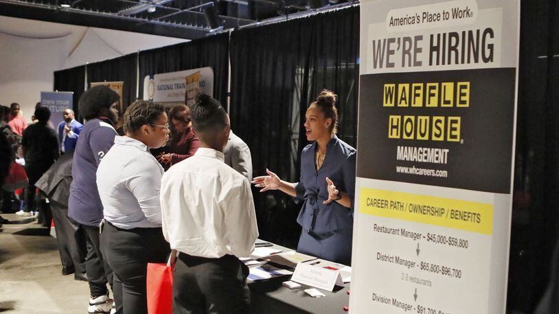 Waffle House was among the companies at an East Point job fair on Wednesday. The Metro Atlanta Chamber, 100,000 Opportunities Initiative and the Fulton, DeKalb, Clayton and Douglas County Solicitors hosted the second annual Opportunity ATL job and resource fair. Onsite services included interview coaching, mobile computer labs for on-the-spot applications sponsored by WorkSource Georgia and free professional attire sponsored by Goodwill of North Georgia. While the fair was aimed at young adults, job seekers of all age groups appeared to be attending. Bob Andres / robert.andres@ajc.com