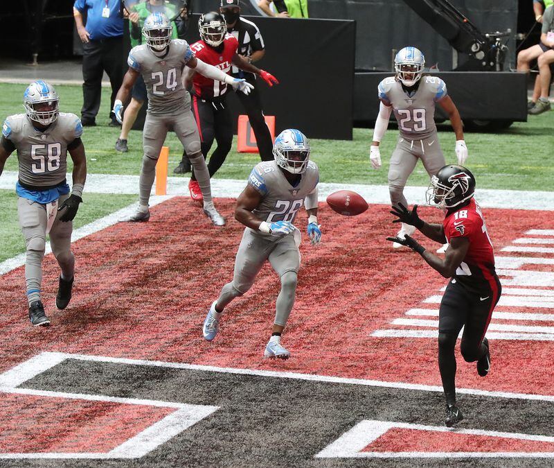 Falcons wide receiver Calvin Ridley gets past Detroit Lions safety Duron Harmon for a touchdown catch that gave Atlanta a 14-7 lead during the second quarter Sunday, Oct. 25, 2020, at Mercedes-Benz Stadium in Atlanta. (Curtis Compton / Curtis.Compton@ajc.com)