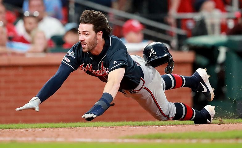 Photos: Braves win in dramatic fashion, lead Cardinals 2-1 in NLDS