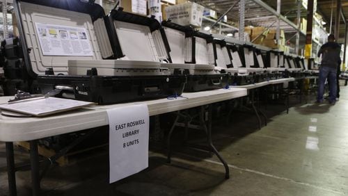 Early voting machines wait to be processed at the Fulton County Elections Preparation Center in Atlanta on November 8th, 2016. (Photo by Phil Skinner)