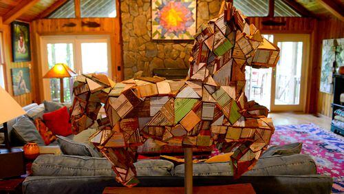 Homeowner and artist Sherry Cook reused wood architectural elements salvaged from old homes for this folk art sculpture of a horse. (