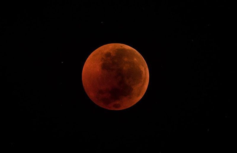 A view of a full moon during a 'blood moon' eclipse on July 28, 2018 in Yogyakarta, Indonesia. Stargazers viewed Friday's total lunar eclipse, which was the longest blood moon visible this century, until 2123.