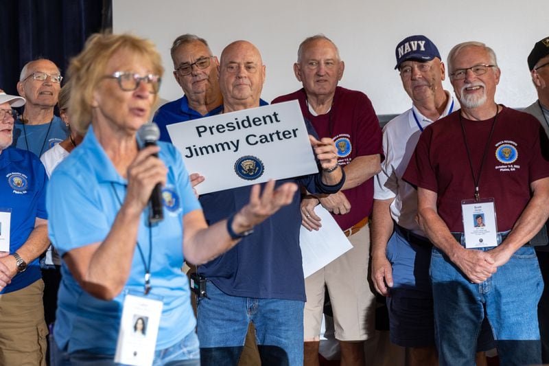 Former employees of the White House Communications Agency who worked for Jimmy Carter gather for a photo during a reunion at the Jimmy Carter National Historic Site in Plains on Saturday, September 30, 2023, the day before Carter’s 99th birthday. (Arvin Temkar / arvin.temkar@ajc.com)