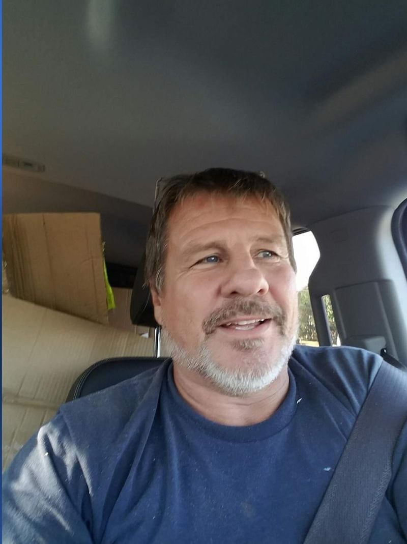 Christopher Eberhart, 57, was shot and killed during a carjacking on Peachtree Battle Avenue Thursday October 13. Eberhart parked in a driveway waiting to start working. Family photo