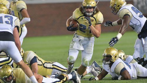 April 21, 2017 Atlanta - Georgia Tech Gold Team running back Quaide Weimerskirch (21) runs with the ball during 2017 Georgia Tech Football Spring Game at Bobby Dodd Stadium on Friday, April 21, 2017. HYOSUB SHIN / HSHIN@AJC.COM