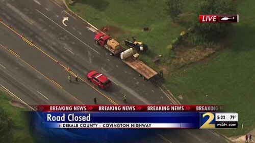 After a work crew struck a gas line, part of Covington Highway was evacuated and several lanes are closed.