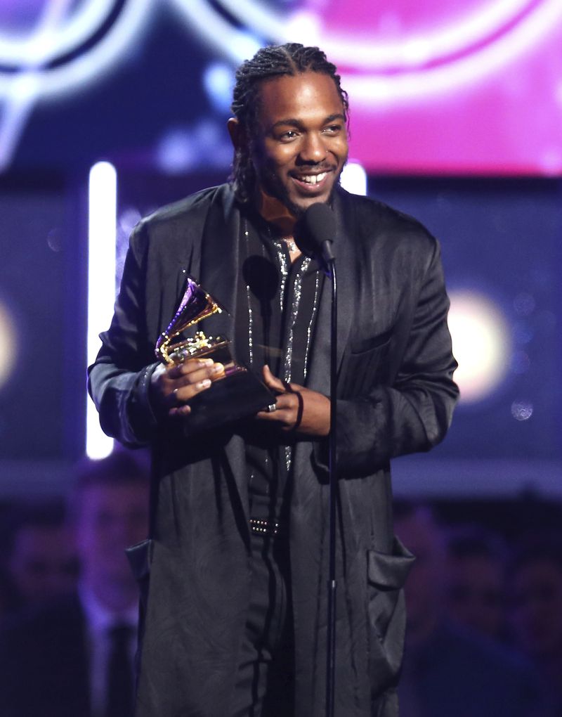  Kendrick Lamar accepts the award for best rap album for "Damn" at the 60th annual Grammy Awards at Madison Square Garden on Sunday, Jan. 28, 2018, in New York. (Photo by Matt Sayles/Invision/AP)