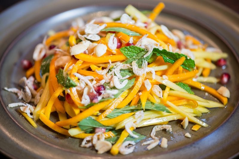 Butternut squash salad with green mango, pomegranate, herbs, peanuts, dried shrimp, maple nuoc mam. Photo credit: Mia Yakel Photography