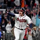 10/16/21 - Atlanta - Atlanta Braves third baseman Austin Riley reacts after hitting a walk-off RBI single scoring second baseman Ozzie Albies (not pictured) to win 3-2 during the ninth inning against the Los Angeles Dodgers in game 1 at the Major League Baseball Championship series game .  Hyosub Shin / Hyosub.Shin@ajc.com