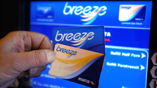 This 2005 photo shows the current MARTA Breeze Card (top) and the Breeze Ticket, which is currently available only to certain groups and special programs. MARTA will gradually phase out the blue Breeze Cards by mid-2017, replacing them with the new silver Card. Breeze Tickets will be available again to all riders at a cost of $1. (Kimberly Smith/AJC staff)