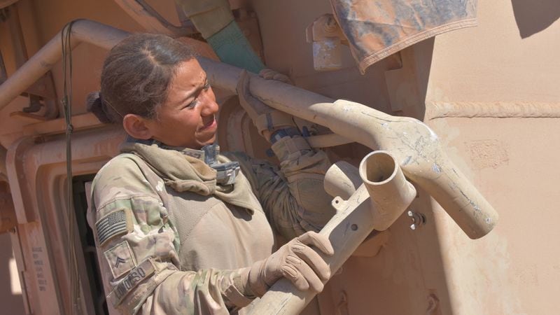 Cpl. Stacy Lomocso, a combat medic with 4th Battalion, 6th Infantry Regiment, 3rd Armored Brigade Combat Team, 1st Armored Division, takes apart the tent aid station on the back of an Armored Medical Evacuation Vehicle at Orogrande, N.M. March 22, 2018. Lomocso participated in Iron Focus 18.1, a brigade exercise designed to prepare 3rd ABCT for the National Training Center.