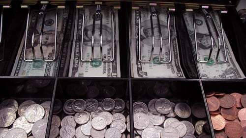 Cash register drawer (lamprey / E+ / Getty Images)