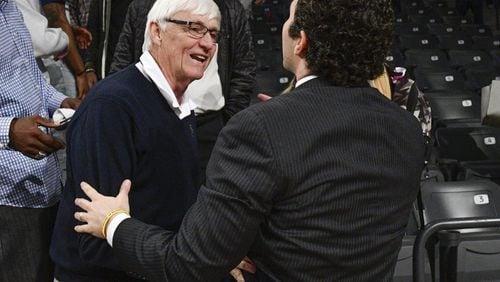 Georgia Tech coaching great Bobby Cremins greets Tech coach Josh Pastner prior to the Yellow Jackets’ Sunday night game against Syracuse. (Special to the AJC/John Amis)
