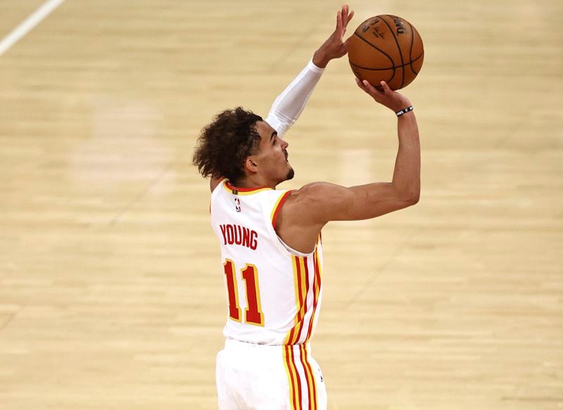 Atlanta Hawks' Trae Young shoots a 3-pointer against the New York Knicks in Game 2 in an NBA basketball first-round playoff series Wednesday, May 26, 2021, in New York. (Elsa/Pool Photo via AP)