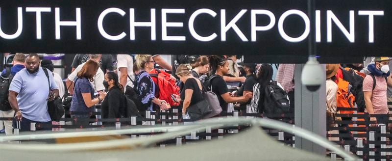 September 1, 2022 Hartsfield-Jackson International Airport: Travelers in the South Checkpoint security line swelled Hartsfield-Jackson International Domestic Airport on Thursday , Sept. 1, 202 (John Spink / John.Spink@ajc.com)


