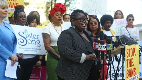 Monica Simpson, executive director of SisterSong, speaks at a press conference following the American Civil Liberties Union, the ACLU of Georgia, the Center for Reproductive Rights, and Planned Parenthood filing of a lawsuit challenging Georgia's HB 41, the 'heartbeat bill,' on the steps of the Richard B. Russell Federal Building, on Ted Turner Drive SW in Atlanta, on Friday, June 28, 2019. The 'heartbeat bill' set to take effect on January 1, 2020. The law bans abortion as early as six weeks into pregnancy, before many people even know they are pregnant. Supporters of the measure hope the law will serve as a test case that will rise to the U.S. Supreme Court and challenge Roe v. Wade. Legal experts expect a judge to issue a preliminary injunction to keep the law from going into effect until the case is settled by the courts.