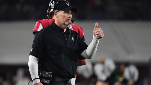 Head coach Dan Quinn of the Atlanta Falcons reacts from the sidelines during the second quarter of the NFC Wild Card Playoff game against the Los Angeles Rams at Los Angeles Coliseum on January 6, 2018 in Los Angeles, California.  (Photo by Harry How/Getty Images)