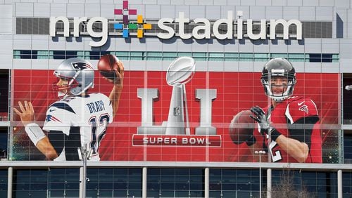 The Falcons and Patriots will play for the Super Bowl tropy in Houston on Sunday. We’ve already been keeping score on Twitter. Photo by Curtis Compton/ccompton@ajc.com