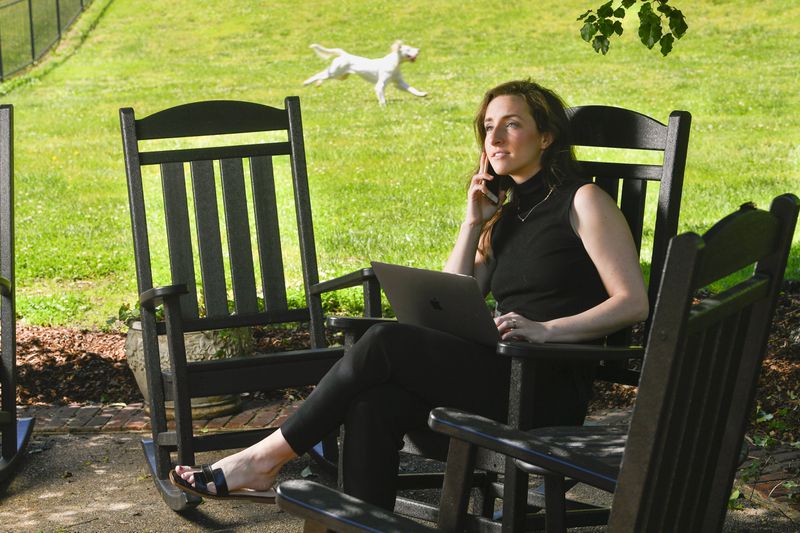 Emily Weddington is pictured at her home in Brentwood, Tenn., a suburban city outside of Nashville, on Friday April 30, 2021. She and her husband decided to move from Atlanta to be closer to family and have a larger yard for their dogs. Because of relaxed work-from-home policies during the pandemic, some workforces now are able to live much farther from where their jobs are based. JOHN AMIS FOR THE ATLANTA JOURNAL-CONSTITUTION