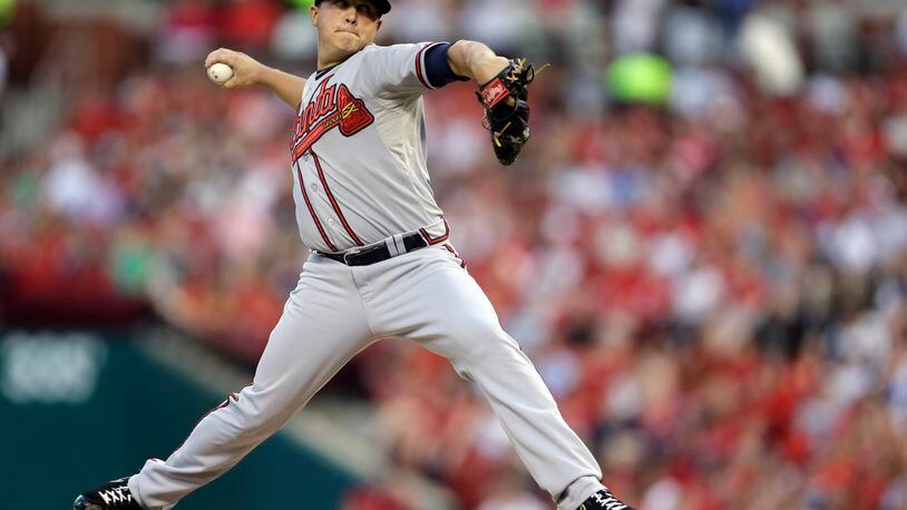 Atlanta Braves starting pitcher Kris Medlen throws during the first inning of a baseball game against the St. Louis Cardinals, Friday, Aug. 23, 2013, in St. Louis. (AP Photo/Jeff Roberson)