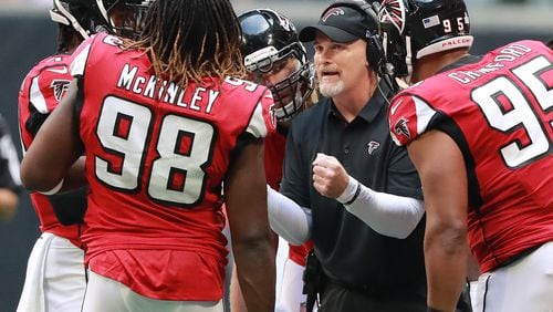 October 14, 2018 Atlanta: Atlanta Falcons head coach Dan Quinn talks with his defense during a first half time out against the Tampa Bay Buccaneers in a NFL football game on Sunday, Oct 14, 2018, in Atlanta.   Curtis Compton/ccompton@ajc.com