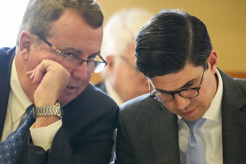 Peter Klett, attorney for The Covenant School, left, and Rocky King, attorney for the The for Covenant Presbyterian Church, right, confer during a hearing to decide whether the journals of a Nashville school shooter can be released to the public Tuesday, April 16, 2024, in Nashville, Tenn. (AP Photo/George Walker IV)