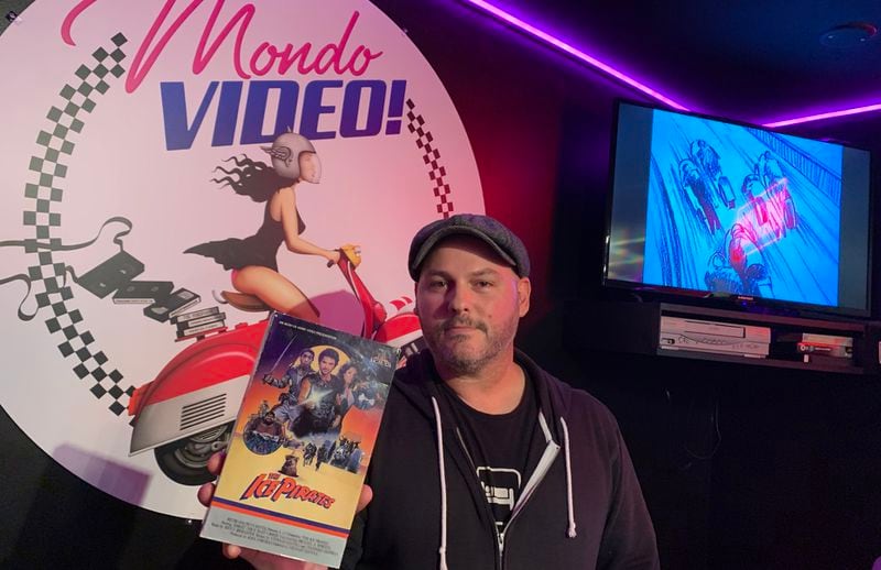 Woodstock animator Anthony Sant'Anselmo spent three years building out his dream 1980s era video rental store in his basement called Mondo Video. He spared no details. RODNEY HO/rho@ajc.com