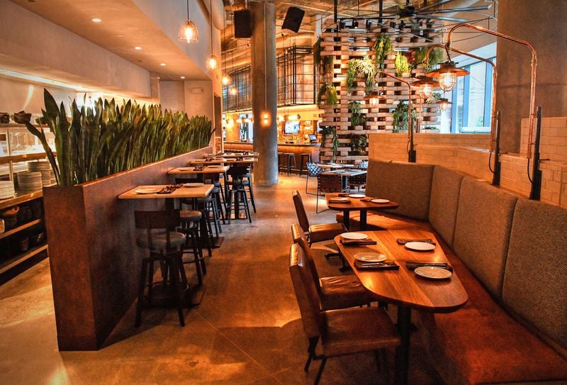 Before Fifth Group dining rooms — like this one at Alma Cocina Buckhead — were reopened, staffers were trained on new safety protocols. Mia Yakel for The Atlanta Journal-Constitution