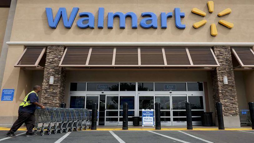 Wal-Mart is being sued by a woman who claims she was hurt by a falling Snapple display in DeKalb County.
