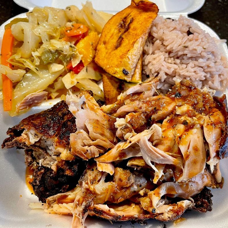 The spicy, sweet flavor reaches into the tender, juicy jerk chicken at Perfect Seasoning. Angela Hansberger for The Atlanta Journal-Constitution