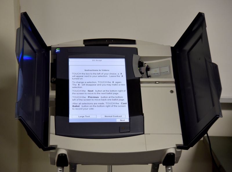 A lawsuit filed by a group of election integrity advocates and voters is asking that Georgia’s 27,000 electronic voting machines, which have no independent paper backup, be replaced by a paper-ballot system before November’s elections. State officials say the current system is safe and accurate. BRANT SANDERLIN/BSANDERLIN@AJC.COM