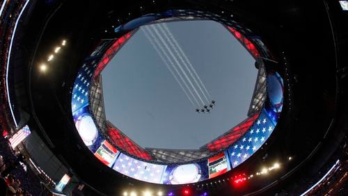 2/3/19 - Atlanta - Military jets fly over before the New England Patriots play the Los Angeles Rams in Super Bowl LIII on Sunday, Feb. 3, 2019 at Mercedes-Benz Stadium in Atlanta, Ga.   The image is featured in a special cover photo in Monday's Atlanta Journal-Constitution. Photo by Bob Andres / bandres@ajc.com