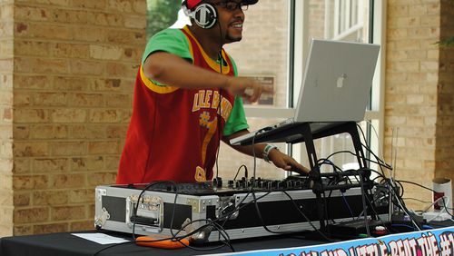 DJ Willy Wow spins dance tunes at Fernbank Museum of Natural History. Contributed by Fernbank Museum of Natural History