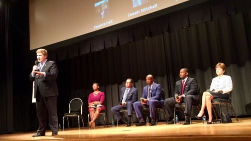 Former Atlanta Chief Operating Officer Peter Aman (left) addresses the crowd at a mayoral forum held by the Council for Quality Growth, Thursday, Sept. 13, 2017. City Councilwoman Keisha Lance Bottoms (second from left), former Fulton County Commission Chairman John Eaves, Atlanta City Councilman Kwanza Hall, Atlanta City Council President Ceasar Mitchell and City Councilwoman Mary Norwood also attended. J. SCOTT TRUBEY/STRUBEY@AJC.COM